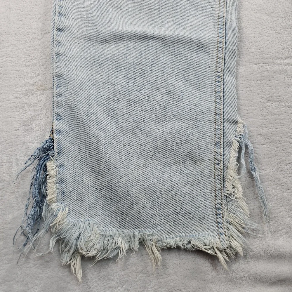 Vtg Levi's 560 Orange Tab Jeans 34x29 90s USA Loose Tapered Light Wash Raw Hem